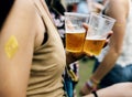 Woman with Beers Enjoying Music Festival Royalty Free Stock Photo