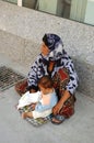 Woman beggar asking for money in Kusadasi, Turkey