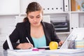 Woman beginner is having productive day at work