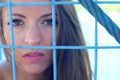 Woman rights defence locked fence in cage portrait Royalty Free Stock Photo