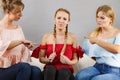 Woman being bullied by two females