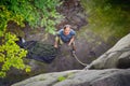 Woman belaying another climber with rope