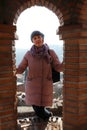 Woman at bell tower in Signagi