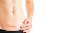 Woman belly with scar c Cesarean healing cream medicine isolated white background concept