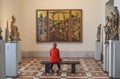 A woman looking at a piece of art in Bode Museum, Berlin, Germany, September 2017 Royalty Free Stock Photo