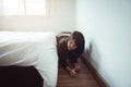 Woman bent and searching something under bed Royalty Free Stock Photo