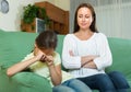 Woman berating crying daughter Royalty Free Stock Photo