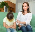 Woman berating crying daughter Royalty Free Stock Photo