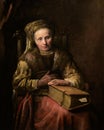 Woman with bible, by famous Dutch Golden Age painter Karel van der Pluym