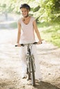 Woman on bicycle smiling