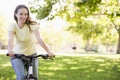 Woman on bicycle smiling