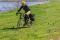 Woman bicyclist on competition