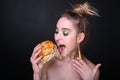 Woman with big hamburger