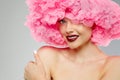 Woman Big Hat and Lips. Model wearing Fabric with lace ruffles hat. High Fashion Model fabric crown or hairstyle