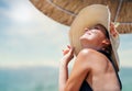 Woman in big straw hat enjoyed with summer sun Royalty Free Stock Photo