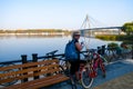 Woman on a bike ride in the park along the river