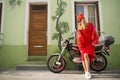 Woman biker at bike transport. Royalty Free Stock Photo