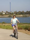 A Woman Bikes Fiesta Island, Mission Bay, San Diego