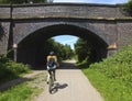 A Woman Bikes the Wirral Way, West Kirby Royalty Free Stock Photo