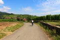 A woman biking through Alsace Royalty Free Stock Photo