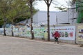 A woman biking on street in Taichung, Taiwan