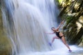 Woman and bikini black relax at Erawan Waterfall