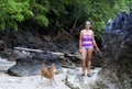 Woman bikini and dog relax with green nature on Koh