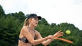 Woman in bikini playing beach-tennis Royalty Free Stock Photo