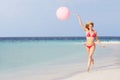 Woman In Bikini Running On Beautiful Beach With Balloon Royalty Free Stock Photo