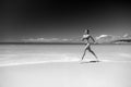 Woman in bikini running on sea beach Royalty Free Stock Photo