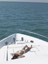 Woman In Bikini Sunbathing On Yacht Royalty Free Stock Photo