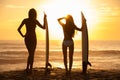 Woman Bikini Surfer Girls & Surfboards Sunset Beach Royalty Free Stock Photo