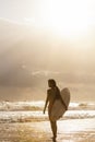 Woman Bikini Surfer & Surfboard Sunset Beach Royalty Free Stock Photo