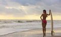 Woman Bikini Surfer & Surfboard Sunset Beach Royalty Free Stock Photo