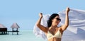 woman in bikini swimsuit with pareo on beach Royalty Free Stock Photo