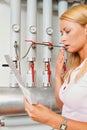 Woman with billing of heating costs for heating Royalty Free Stock Photo