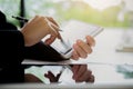 Woman with bills and calculator. Woman using calculator to calculate bills at the table in office. Calculation of costs. Royalty Free Stock Photo