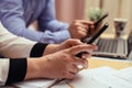 Woman with bills and smart phone at the table Royalty Free Stock Photo