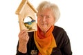 Woman with birdhouse