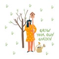 Woman with birdhouse in the garden. Spring tree,watering can with bird