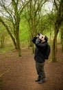 Woman birdwatching Royalty Free Stock Photo