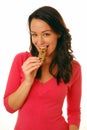 Woman biting cereal bar Royalty Free Stock Photo