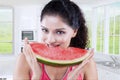 Woman biting fresh watermelon Royalty Free Stock Photo