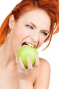 Woman biting green apple Royalty Free Stock Photo