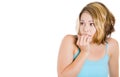 Woman biting her nails and looking to the side with a craving for something or anxious