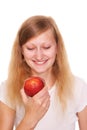 Woman biting a red apple Royalty Free Stock Photo