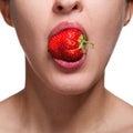 Woman biting strawberry on white Royalty Free Stock Photo