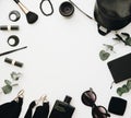 Woman black accessories grouped around empty space for text. Royalty Free Stock Photo