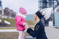 Woman in black coal miner gala uniform with her child. Royalty Free Stock Photo