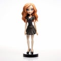 Playful Cartoon Girl Statue With Black Dress And Red Hair